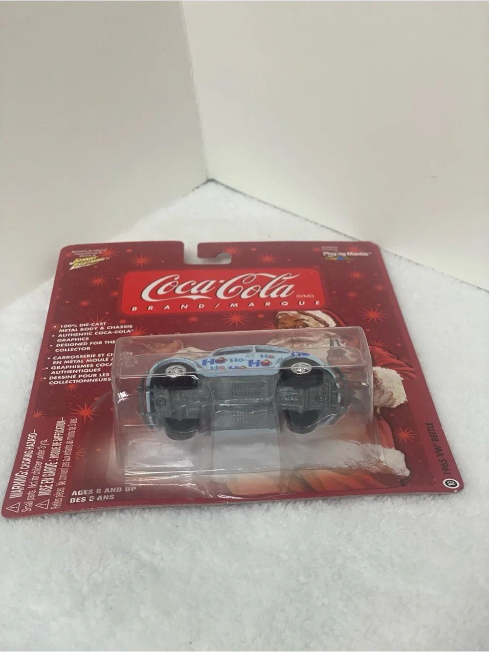 Johnny Lightning Die Cast 1965 Volkswagen Beetle Coca Cola Brand Ho Ho Ho on Car